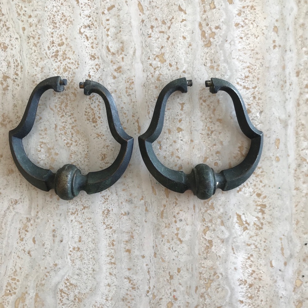 Two antique solid brass drawer handles.